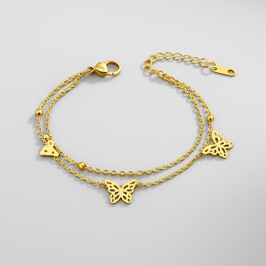 Goud-holle vlinder dubbellaagse armband